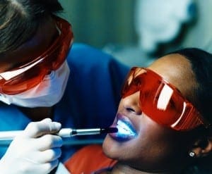 Dentist Examining Teeth